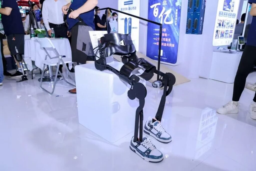 Low-profile walking-assistance exoskeleton being demonstrated in a Chinese rehabilitation technology setting